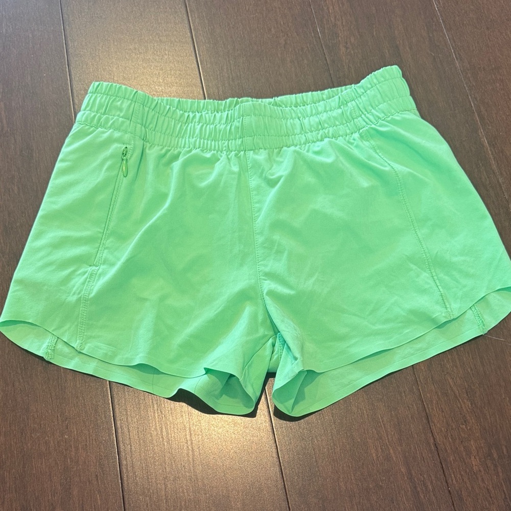 Athleta Light Green Athletic Shorts